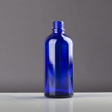 Envase de vidrio ámbar azul